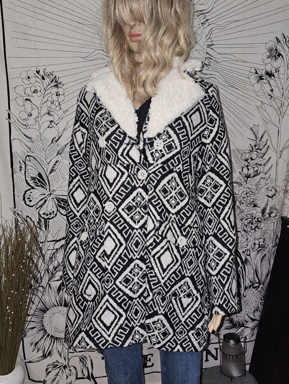 Billabong Audrey peacoat featuring a black and white Aztec geometric pattern